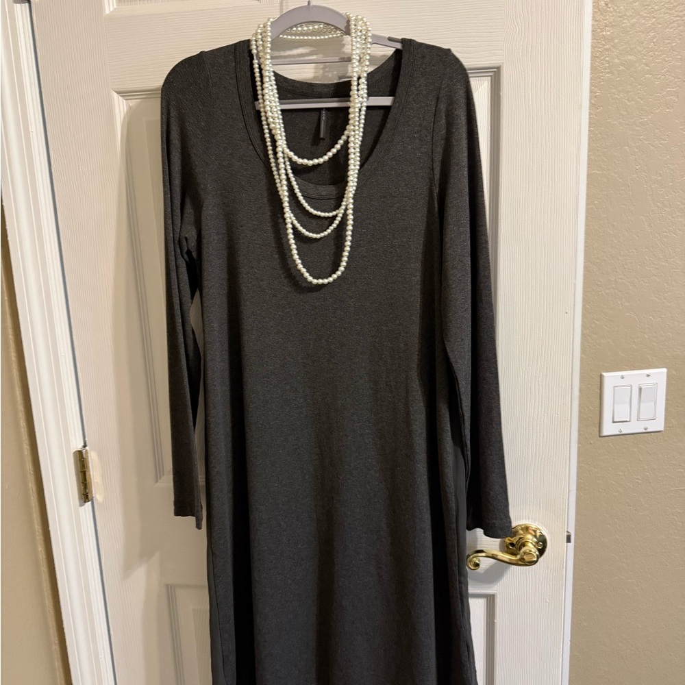 Surprising back detail on gray knit dress